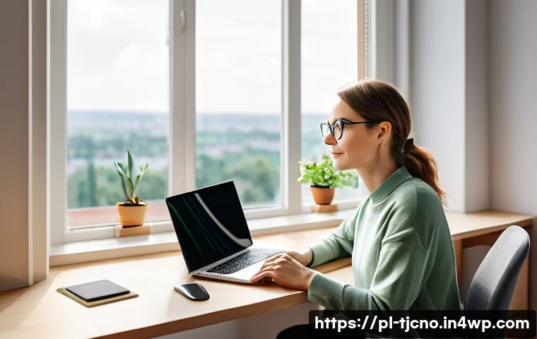 테크노스트레스에 관한 FAQ - A young professional woman sitting at a modern ergonomic office desk in a bright, cozy home office i...